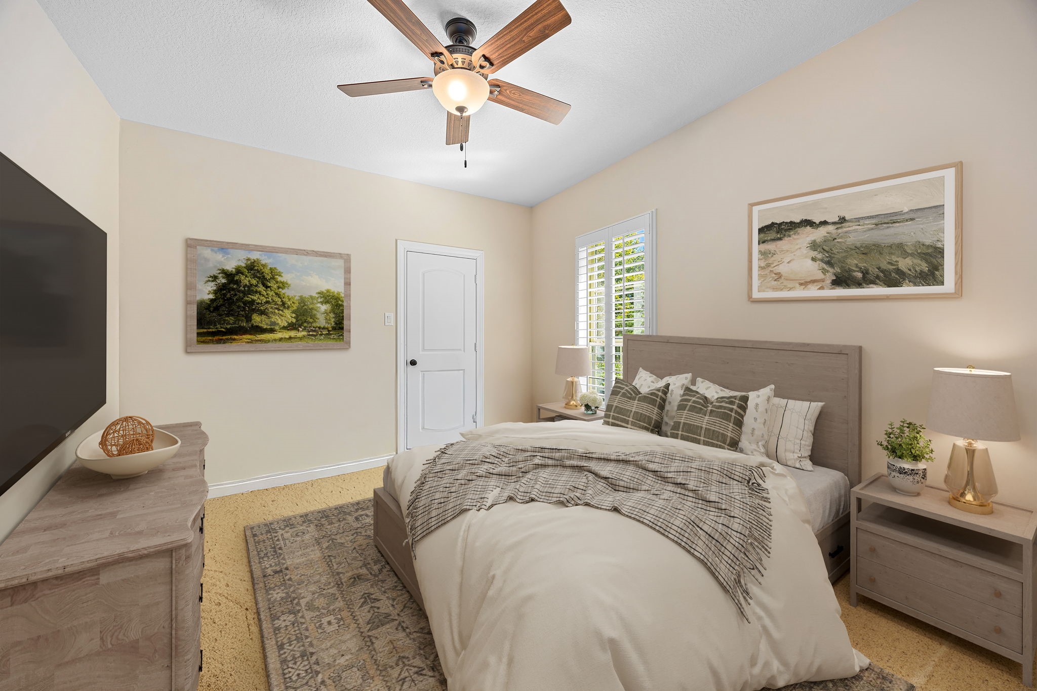 13506 Stagecoach Road Magnolia, TX 77355 - Photo 24 of 37 a spacious bedroom with a bed and a chandelier