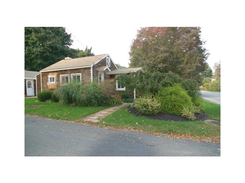 Exterior Front. Cottage style home fully renovated with a separate guest home.  Yard is landscaped with specimen plantings.