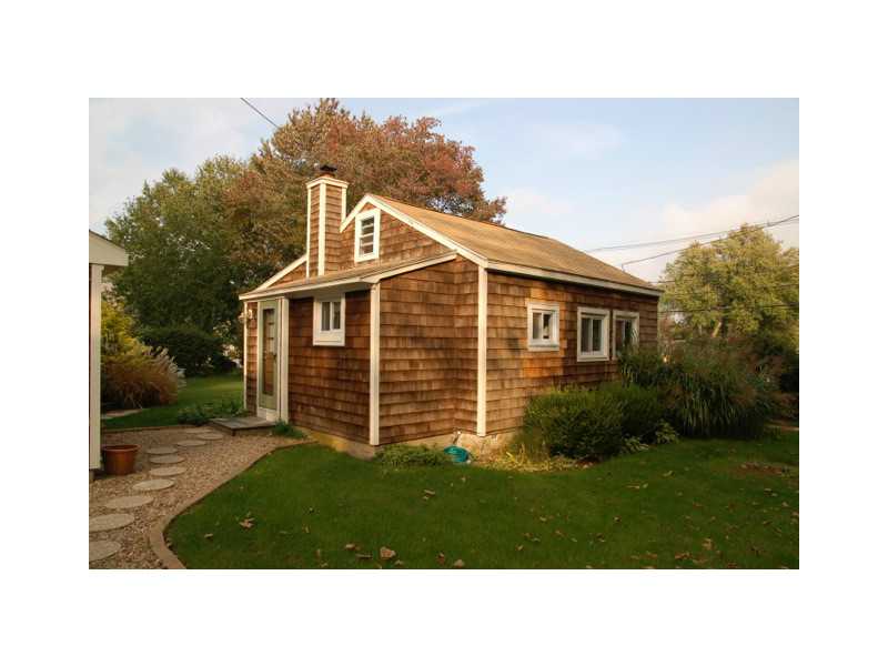 490 Middlebridge Road South Kingstown, RI 02879 - Photo 3 of 18 Exterior Back. View of the exterior back of the primary home that has year round views of Narrow River.