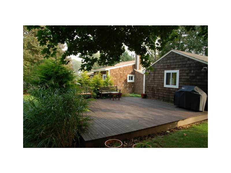 490 Middlebridge Road South Kingstown, RI 02879 - Photo 4 of 18 Patio/Deck. The spacious yard with mature trees and specimen plantings provides a wonderful spot on the patio to enjoy an evening out doors while entertaining guest.