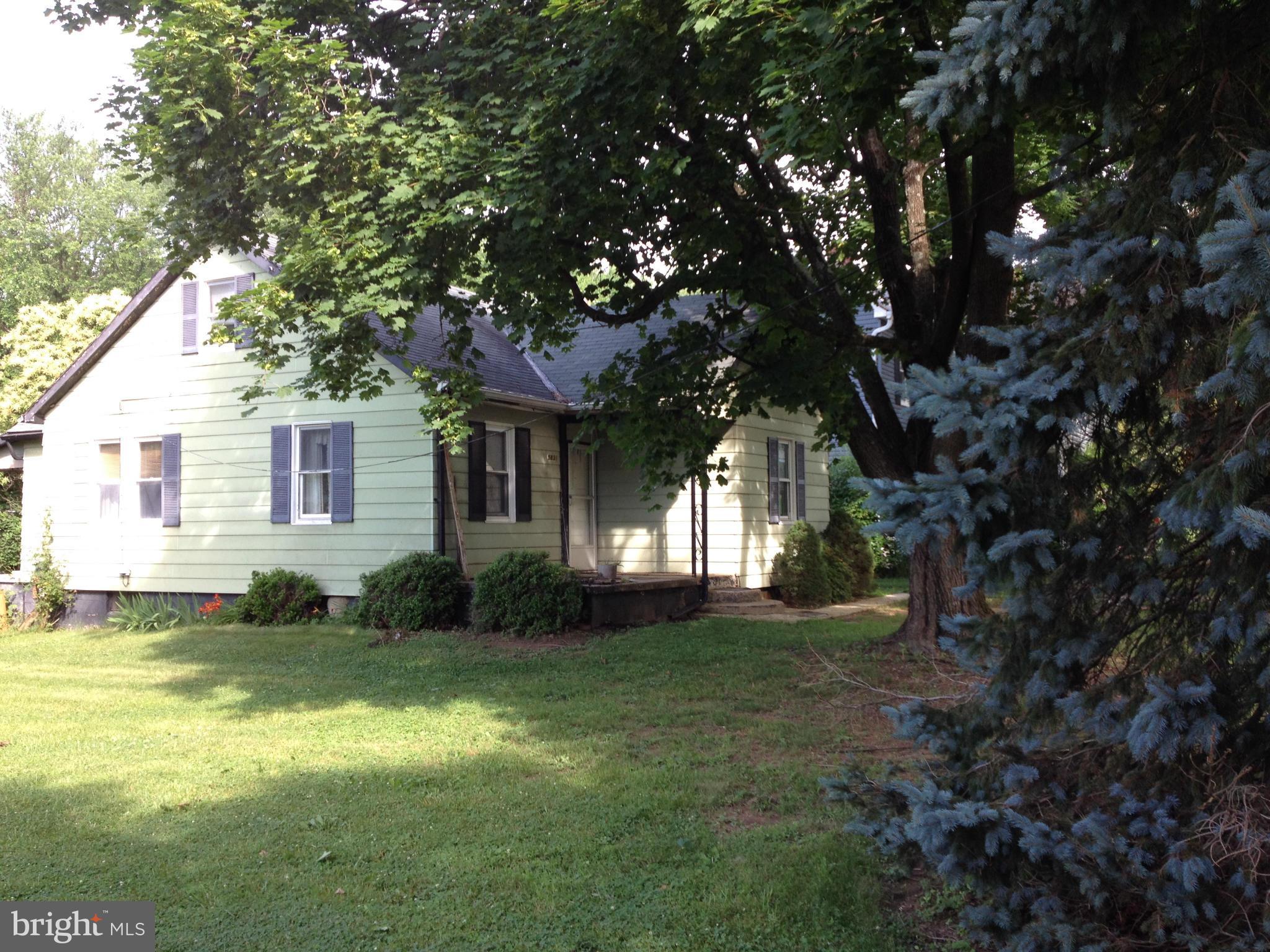5831 Shookstown Road Frederick, MD 21702 - Photo 1 of 7 a view of a house with backyard and garden