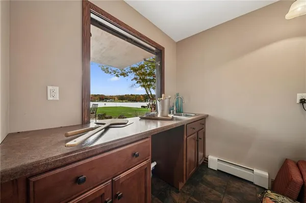 a view of a room with a large window