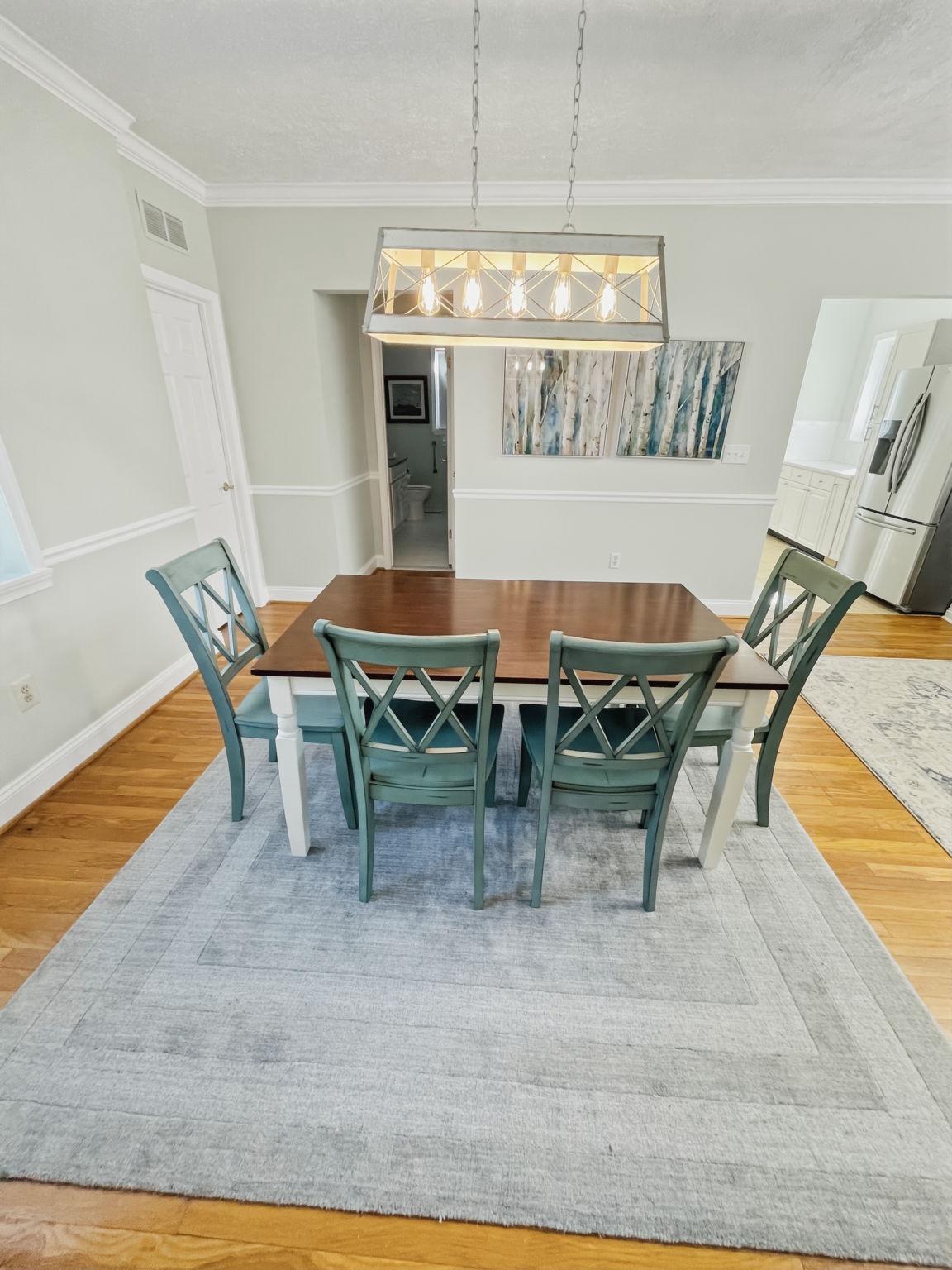 2400 Liberty Road Eldersburg, MD 21784 - Photo 8 of 33 UNIT 1 - Charming dining space with modern flair.