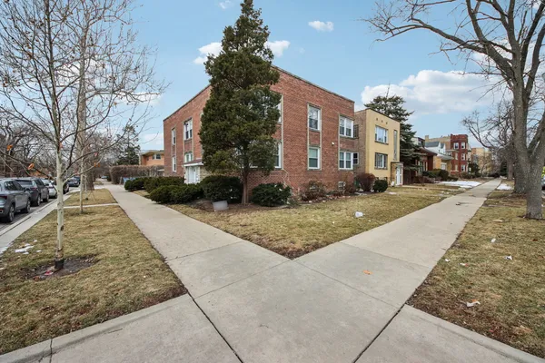 a view of a building with a street