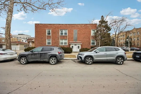 a car parked in front of a house