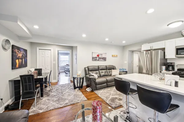 a living room with furniture and a table