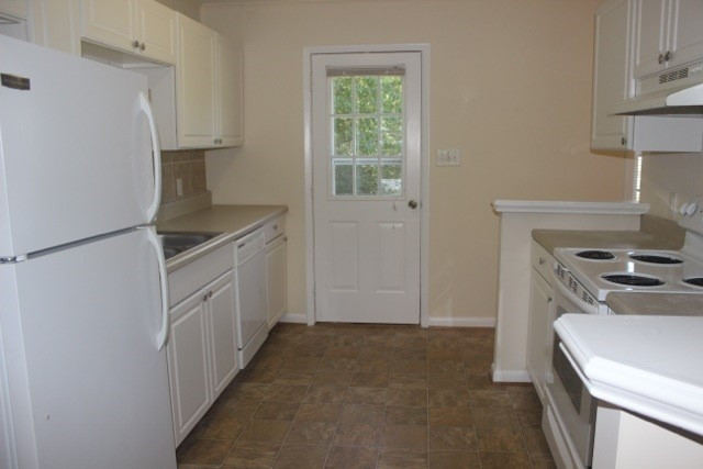 800 Friar Tuck Road Raleigh, NC 27610 - Photo 9 of 18 New kitchen cabinets throughout! Total renovation! Kitchen