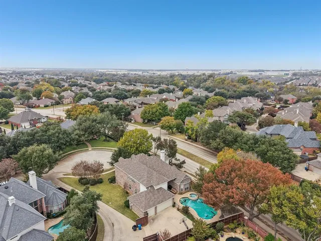 an aerial view of a house with a outdoor space