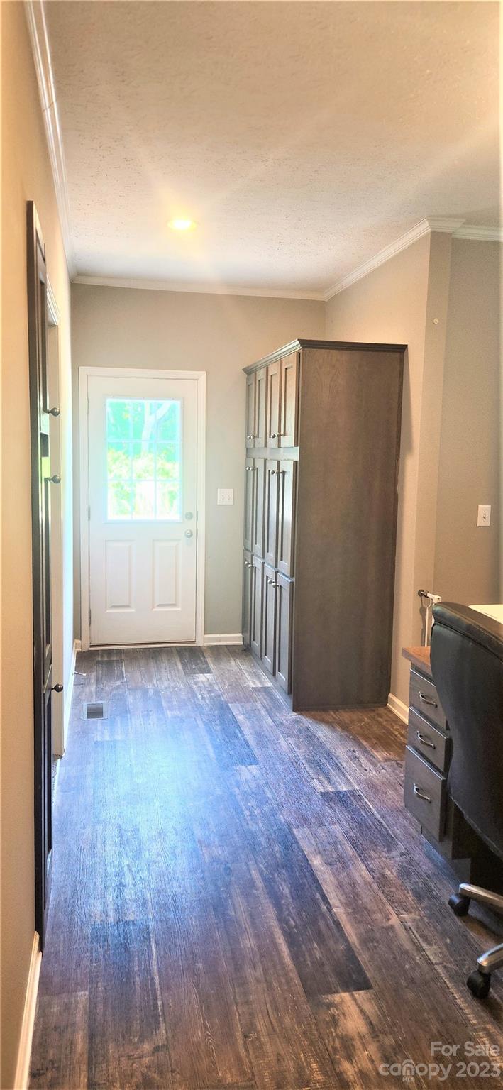 3230 Sorrells Baxter Road Cherryville, NC 28021 - Photo 20 of 29 an empty room with wooden floor and windows