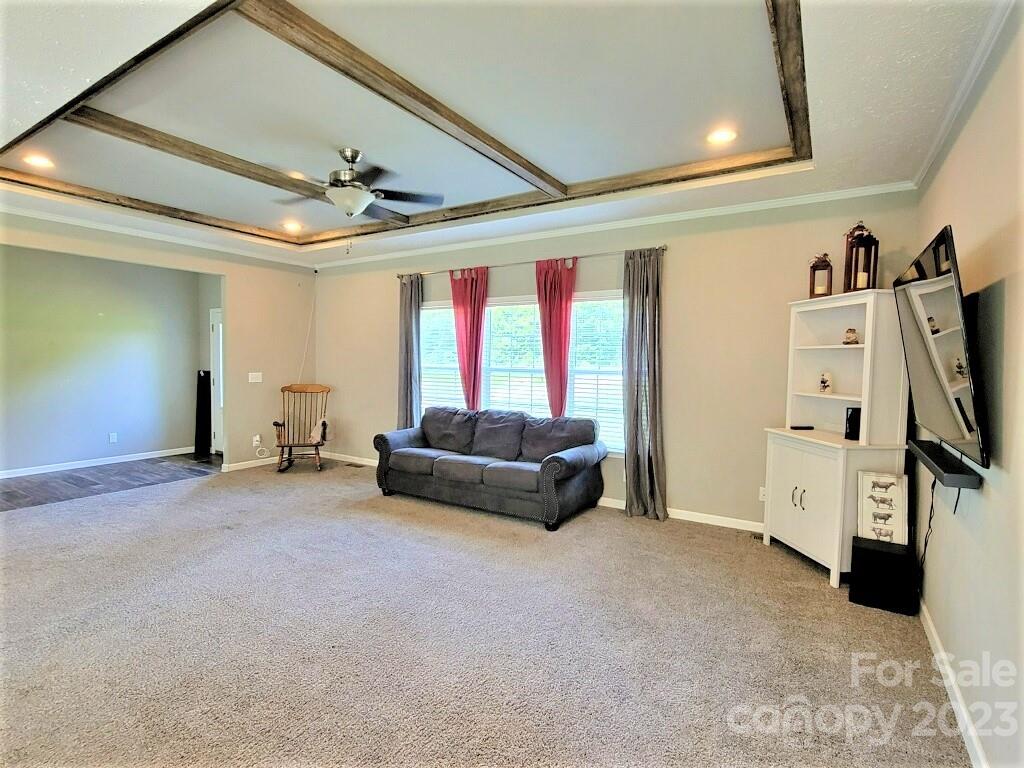 3230 Sorrells Baxter Road Cherryville, NC 28021 - Photo 21 of 29 a living room with furniture and a flat screen tv