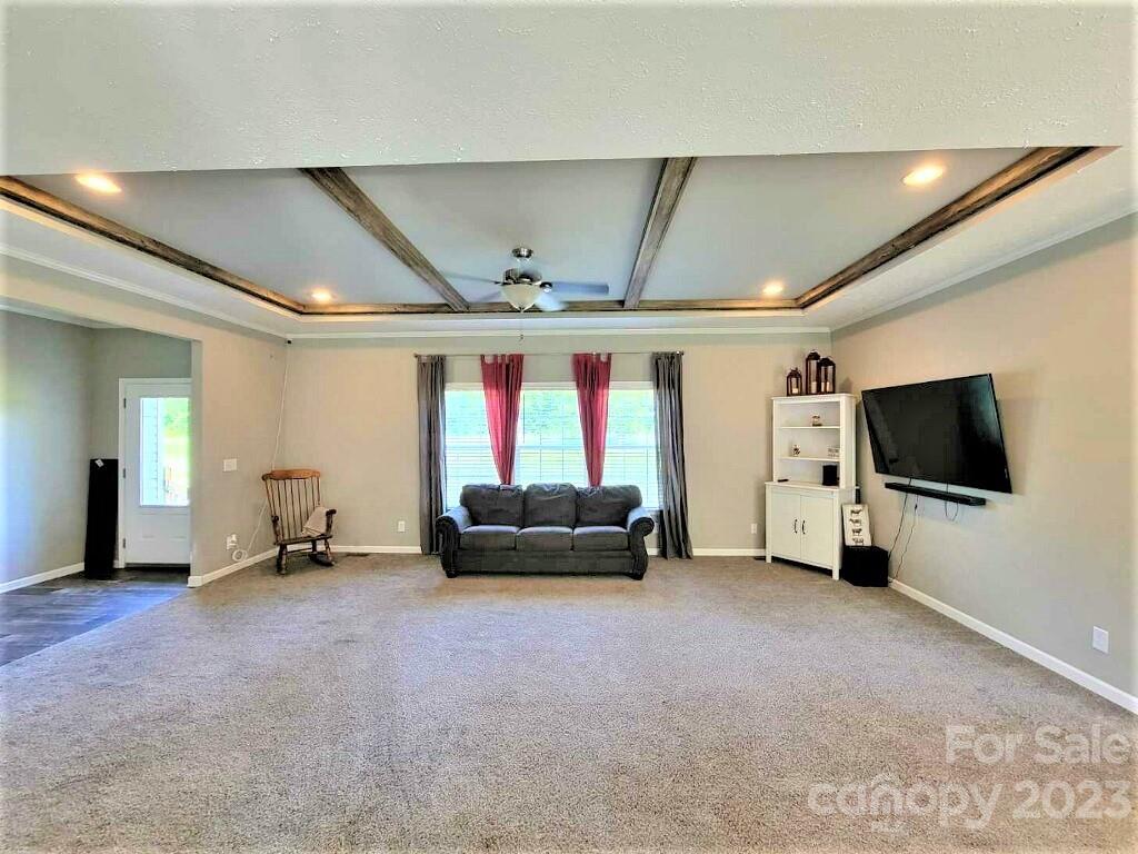 3230 Sorrells Baxter Road Cherryville, NC 28021 - Photo 22 of 29 a living room with furniture and a flat screen tv