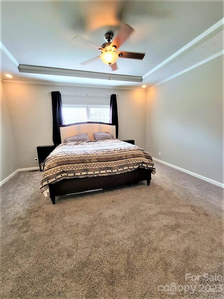 3230 Sorrells Baxter Road Cherryville, NC 28021 - Photo 26 of 29 a bedroom with a bed and a window