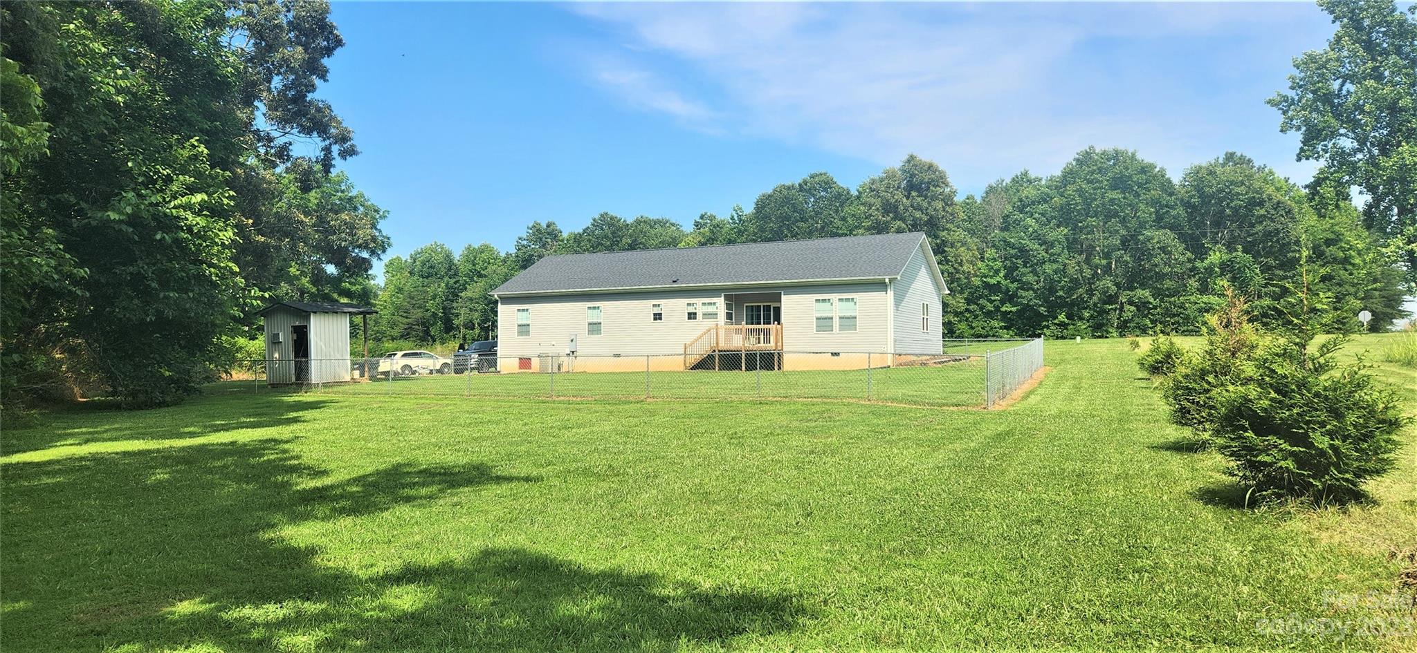 3230 Sorrells Baxter Road Cherryville, NC 28021 - Photo 4 of 29 a house view with a garden space
