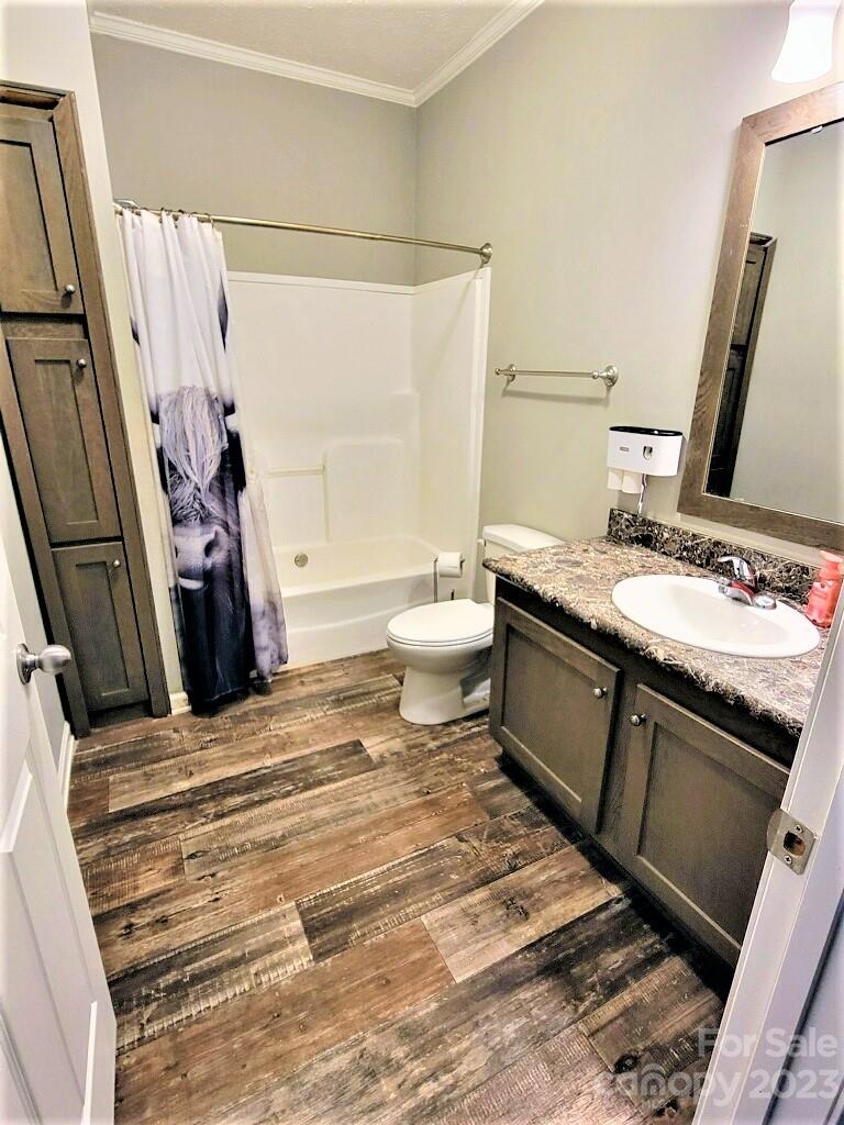 3230 Sorrells Baxter Road Cherryville, NC 28021 - Photo 8 of 29 a bathroom with a sink and a mirror