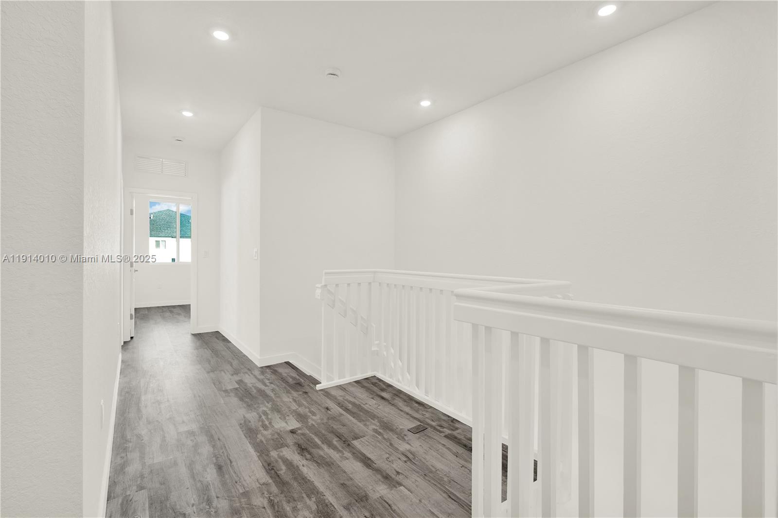22535 Southwest 125th Avenue, Unit 22535 Miami, FL 33170 - Photo 20 of 35 a view of hallway with wooden floor