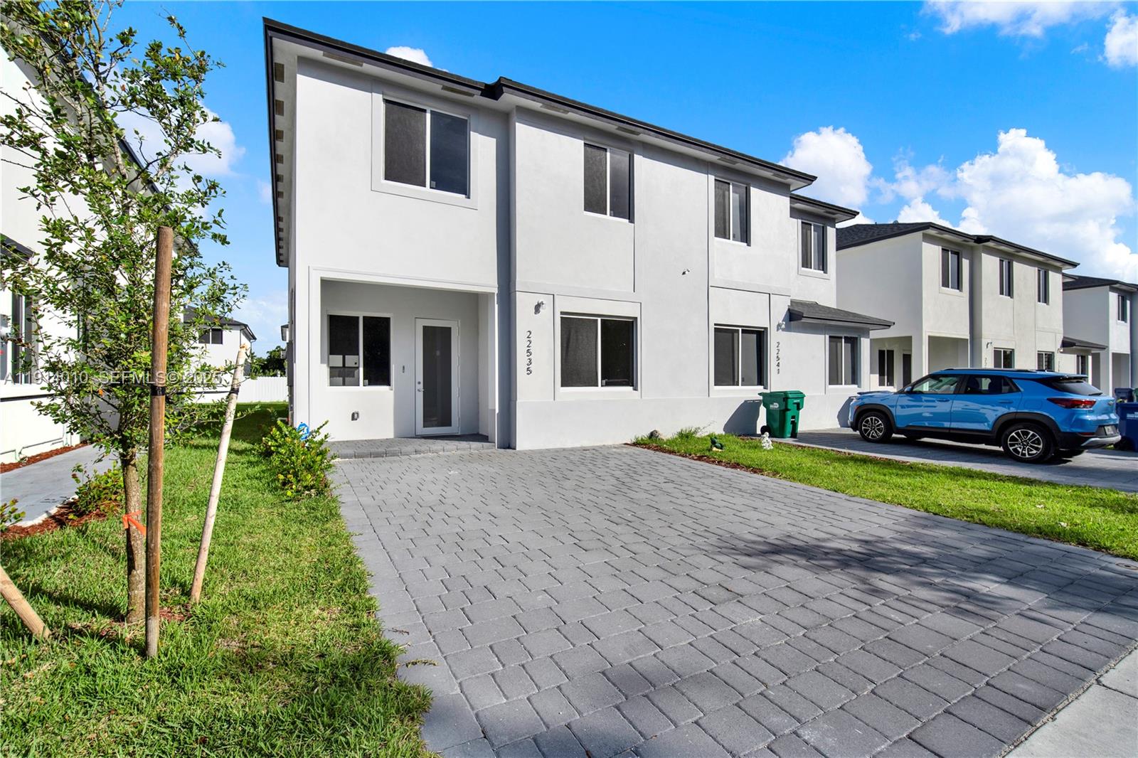 22535 Southwest 125th Avenue, Unit 22535 Miami, FL 33170 - Photo 2 of 35 a house view with a garden space