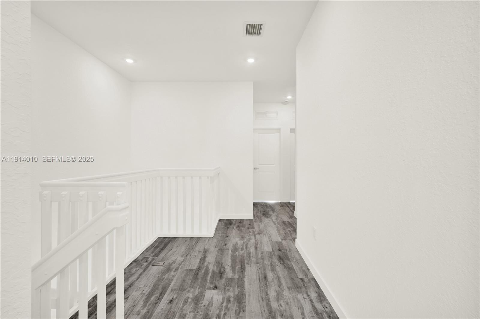 22535 Southwest 125th Avenue, Unit 22535 Miami, FL 33170 - Photo 21 of 35 a view of a room with wooden floor