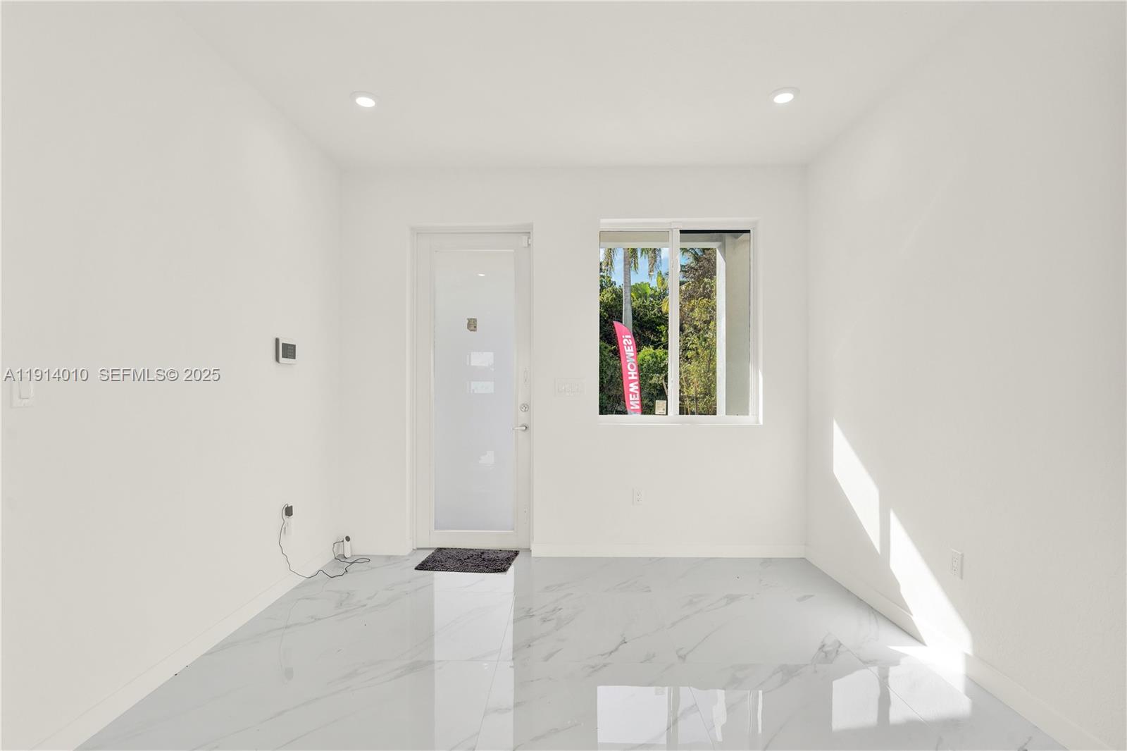 22535 Southwest 125th Avenue, Unit 22535 Miami, FL 33170 - Photo 5 of 35 a view of an empty room with a window