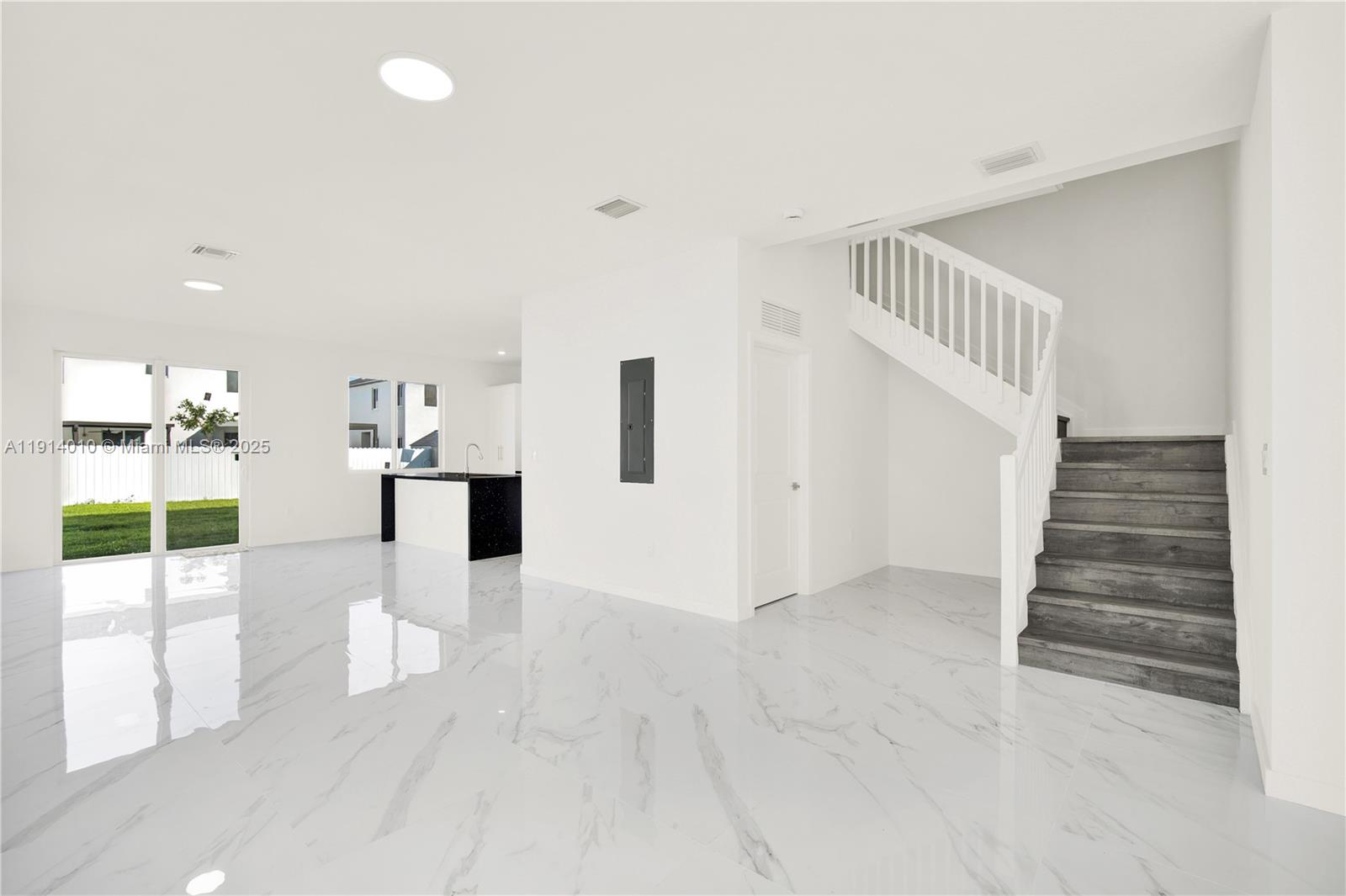 22535 Southwest 125th Avenue, Unit 22535 Miami, FL 33170 - Photo 7 of 35 a view of a hallway with staircase