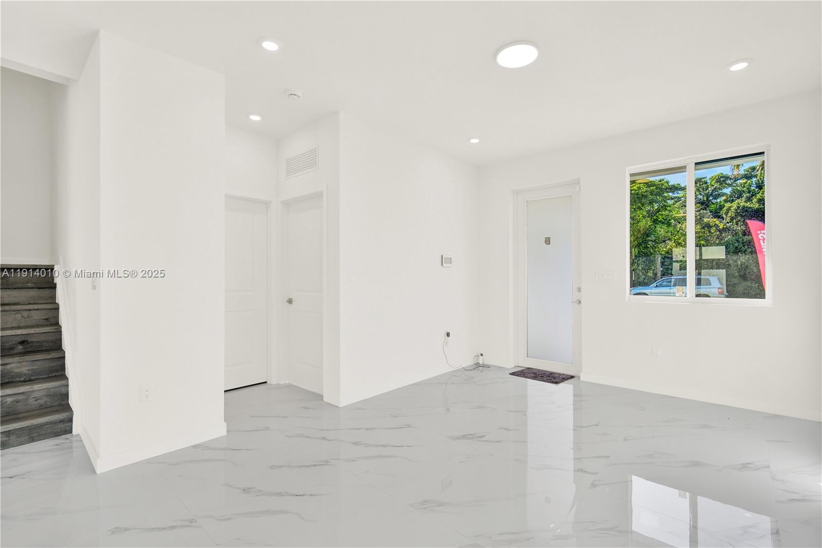 22535 Southwest 125th Avenue, Unit 22535 Miami, FL 33170 - Photo 8 of 35 an empty room with windows