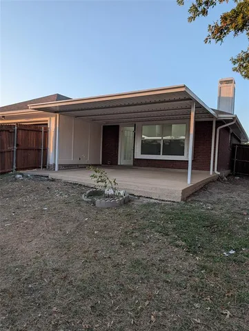 a view of backyard with seating space