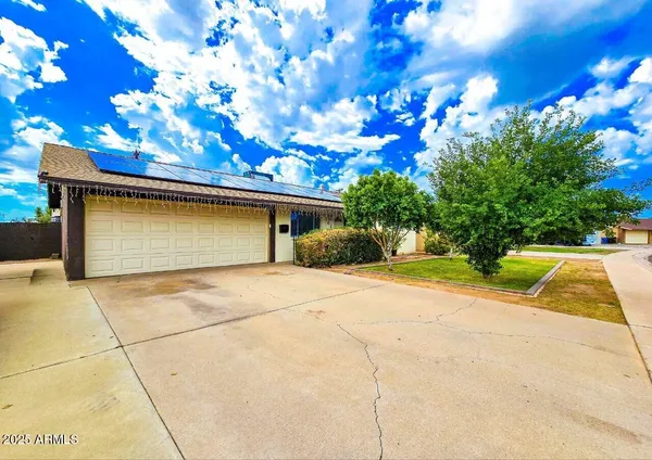 a view of outdoor space garage and basketball court