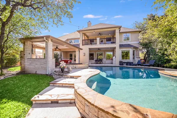 a view of a house with a swimming pool