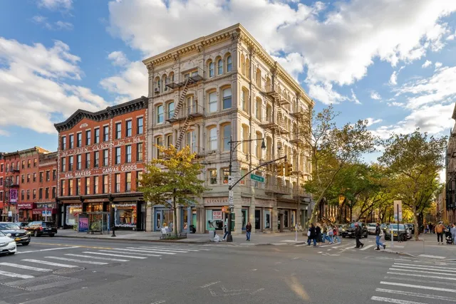 a view of a building and a street
