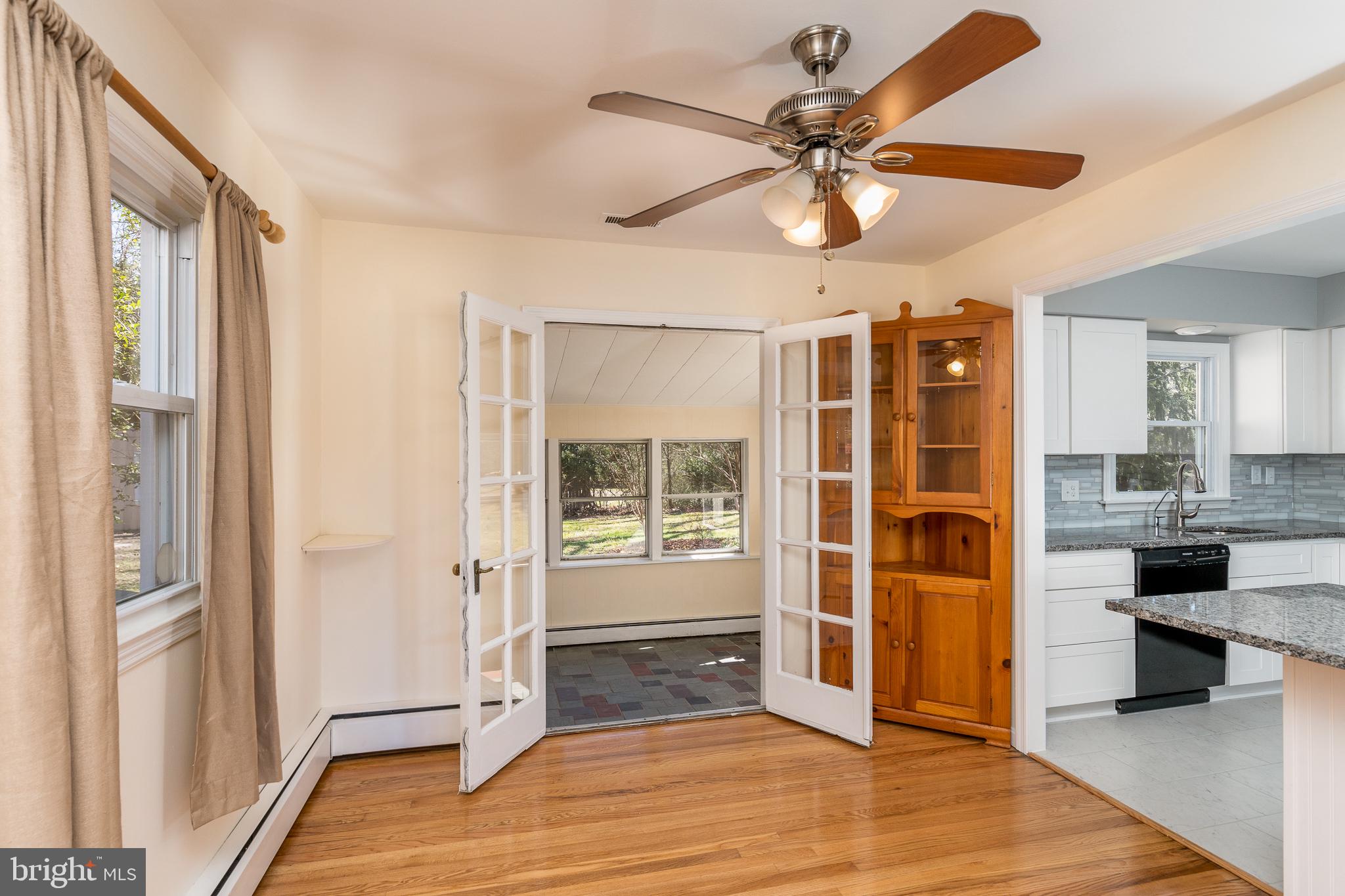 1516 Friendly Road Pasadena, MD 21122 - Photo 8 of 34 French Doors to 3 season Sunroom