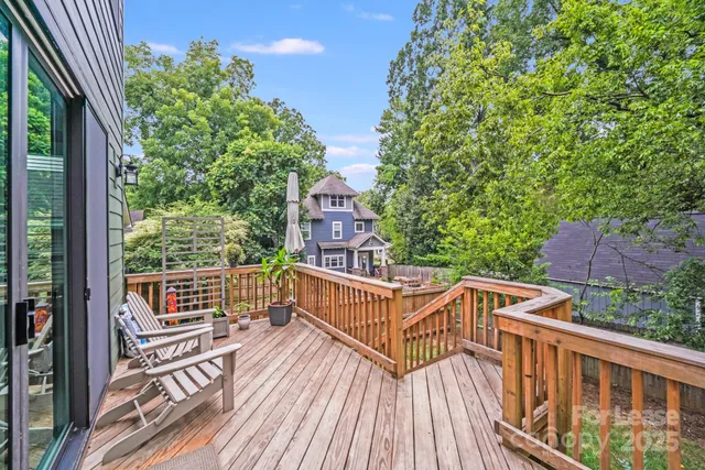 a view of a balcony with wooden floor