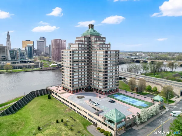 a view of a city with tall buildings