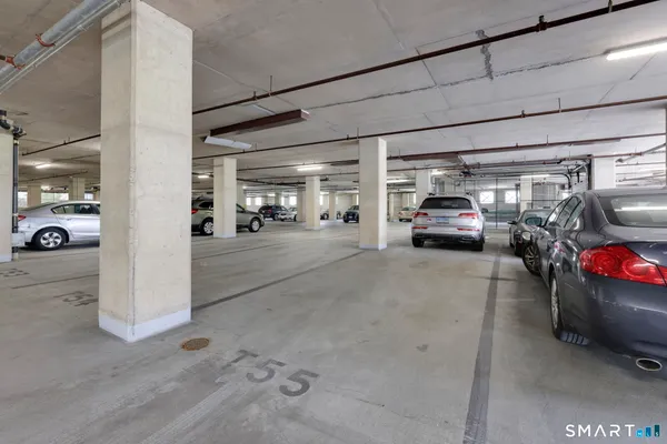 a view of parking area and car parked