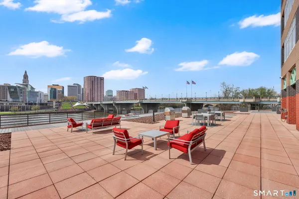 a view of a terrace with sitting area