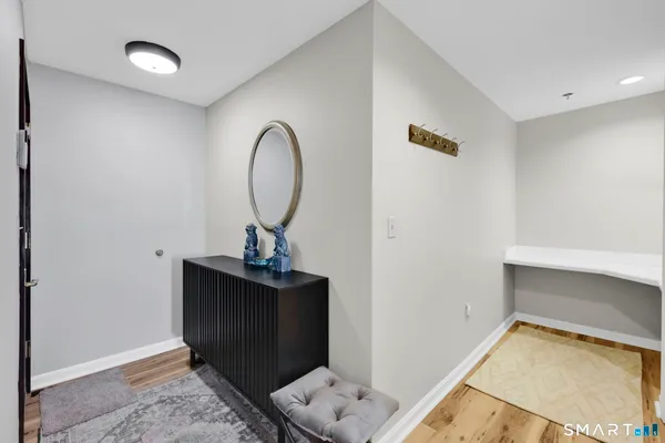 a view of a hallway with entryway