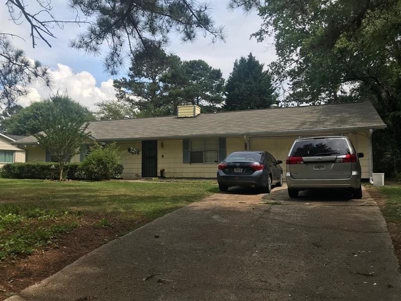4188 White Road Southwest Snellville, GA 30039 - Photo 1 of 1 a car parked in front of a house