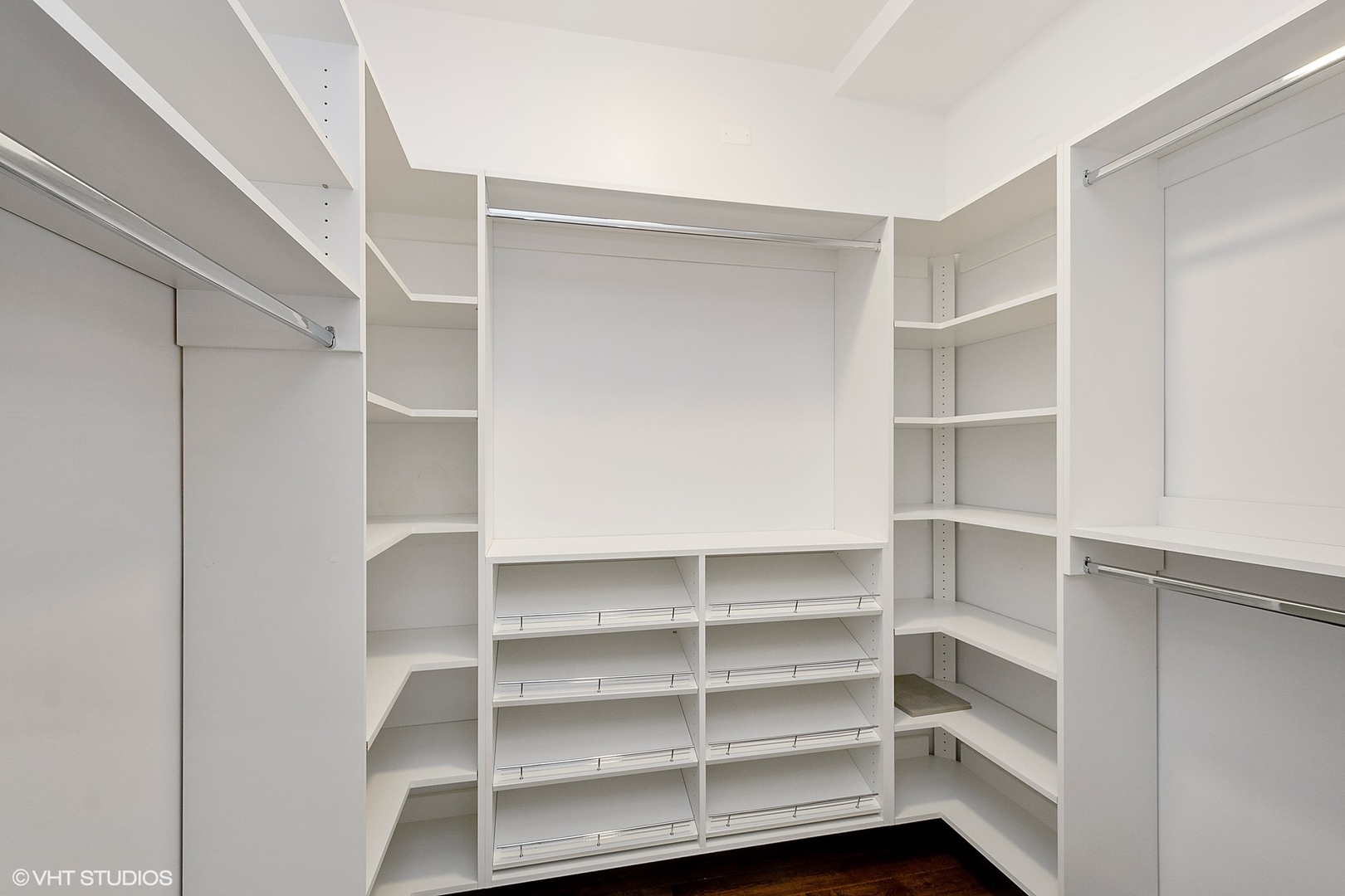 1424 West Fillmore Street, Unit 3E Chicago, IL 60607 - Photo 12 of 21 a view of walk in closet with empty racks
