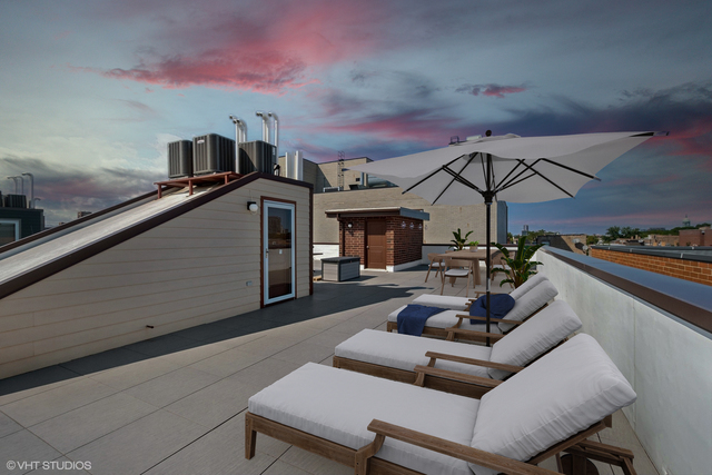 1424 West Fillmore Street, Unit 3E Chicago, IL 60607 - Photo 18 of 21 a outdoor space with patio the couches and a fireplace