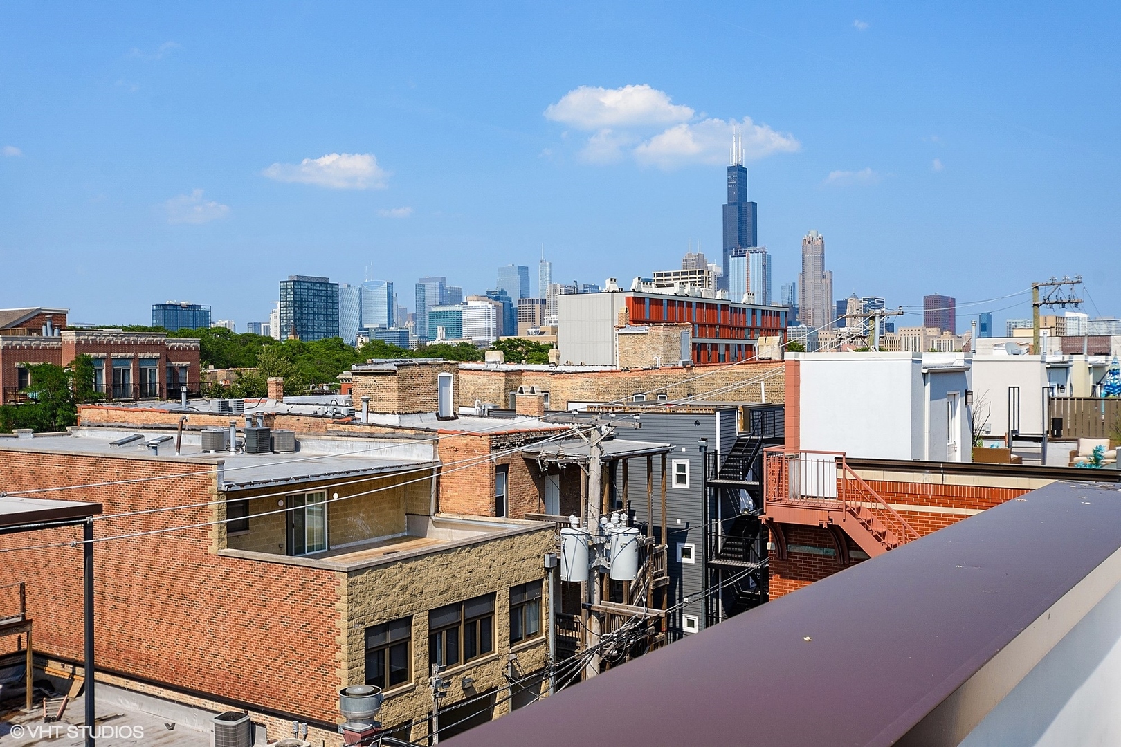 1424 West Fillmore Street, Unit 3E Chicago, IL 60607 - Photo 21 of 21 a view of a city from a patio