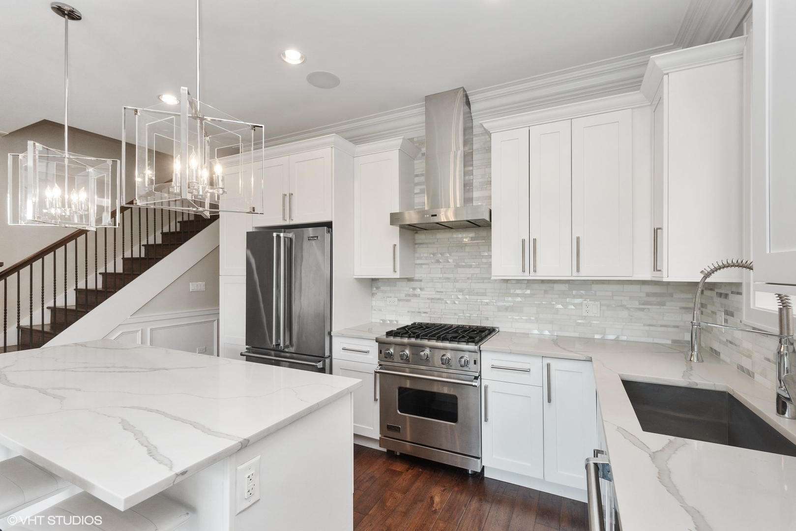 1424 West Fillmore Street, Unit 3E Chicago, IL 60607 - Photo 3 of 21 a kitchen with a sink a stove and cabinets