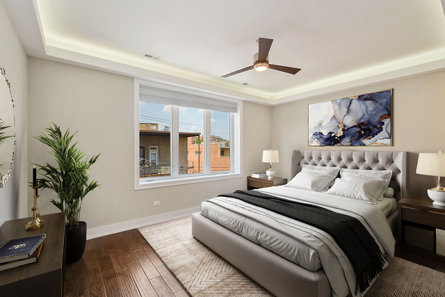 1424 West Fillmore Street, Unit 3E Chicago, IL 60607 - Photo 10 of 21 a bedroom with bed and a potted plant