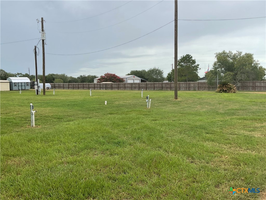 46 County Road 400 Yoakum, TX 77995 - Photo 2 of 23 a view of a golf course with a lake