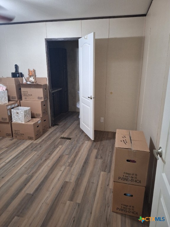 46 County Road 400 Yoakum, TX 77995 - Photo 21 of 23 a room with a dresser and a mirror
