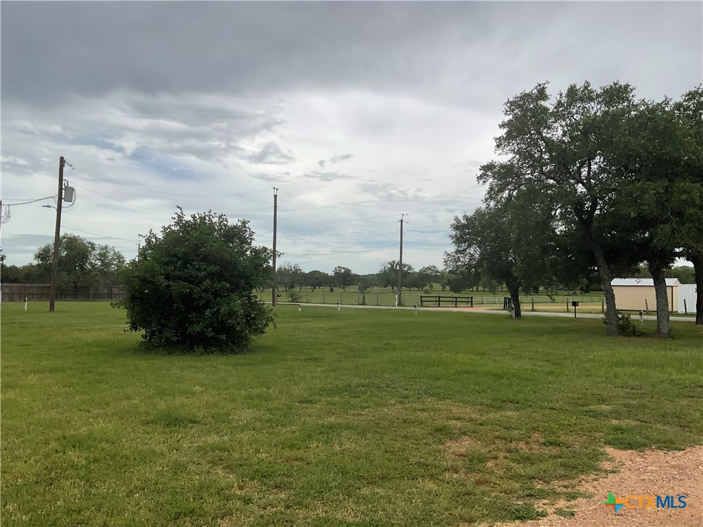 46 County Road 400 Yoakum, TX 77995 - Photo 10 of 23 a view of a golf course with a lake