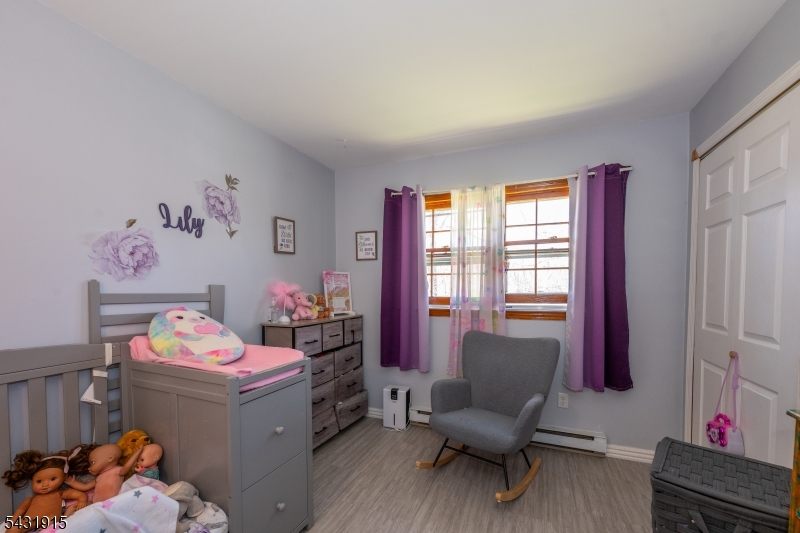 41 Waterloo Road Stanhope, NJ 07874 - Photo 18 of 32 a bedroom with furniture and a window