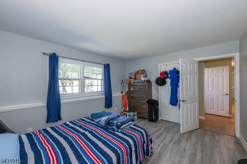 41 Waterloo Road Stanhope, NJ 07874 - Photo 22 of 32 a bedroom with a bed and a window