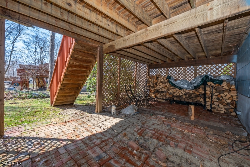41 Waterloo Road Stanhope, NJ 07874 - Photo 27 of 32 a view of a room with wooden walls and stairs