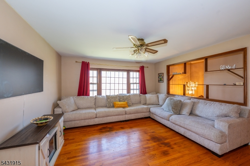 41 Waterloo Road Stanhope, NJ 07874 - Photo 6 of 32 a living room with furniture and a large window