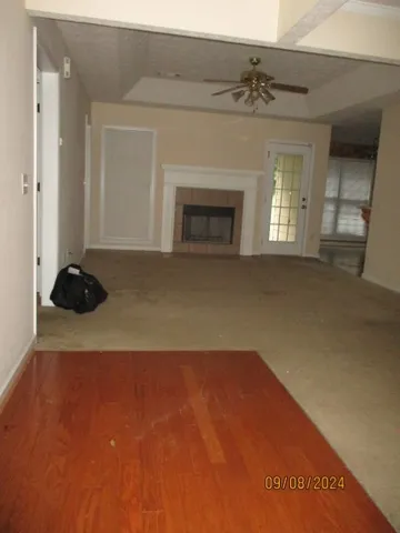 a view of a livingroom with a fireplace