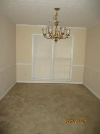 a view of a room with a window