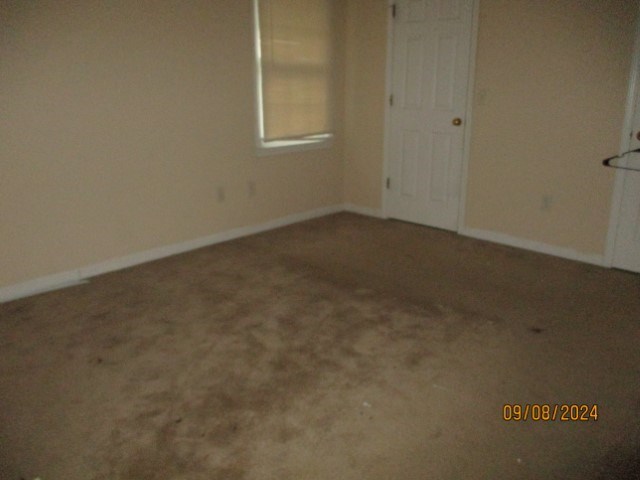 5249 Kingsberry Street Columbus, GA 31907 - Photo 5 of 5 an empty room with a window
